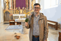 Markus Göstl mit Palmzweige
