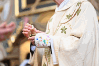 Kommunionspendung Gipshand