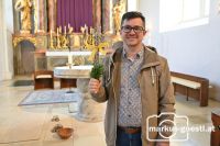 Markus Göstl mit Palmzweige